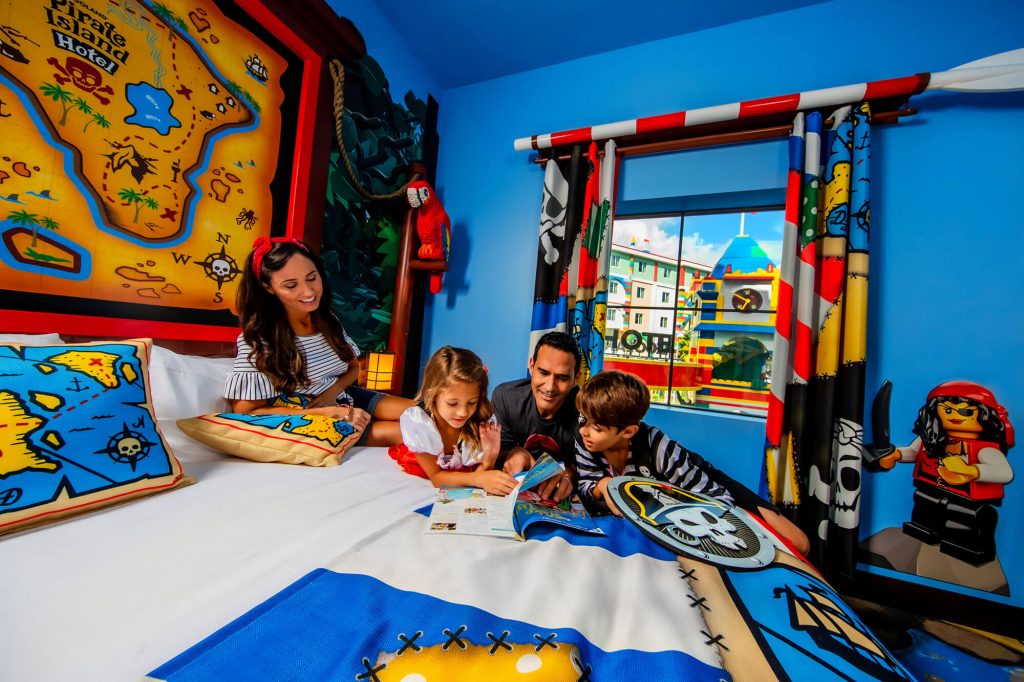 Family in LEGOLAND Pirate Island Hotel guest room in Winter Haven, FL