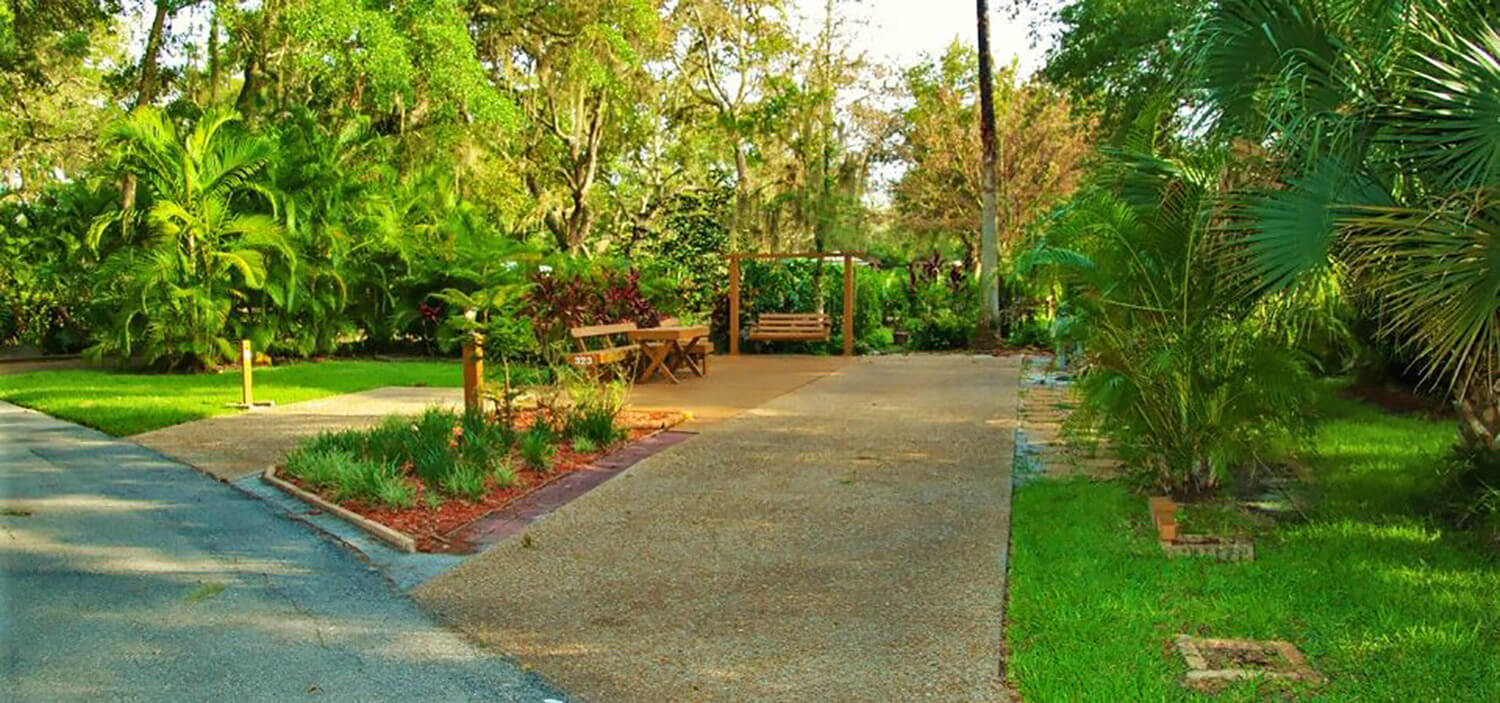 shaded premium RV site at River Ranch RV Resort in Lake Wales, FL
