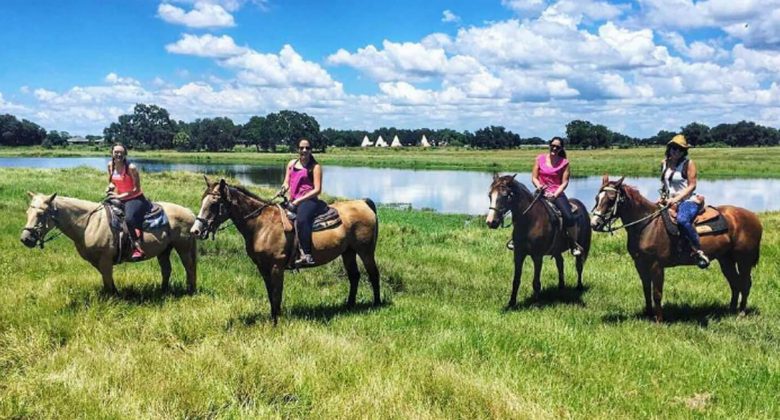 4 women on horses during a Girls Weekend at Westgate River Ranch IG: Westgateranch 