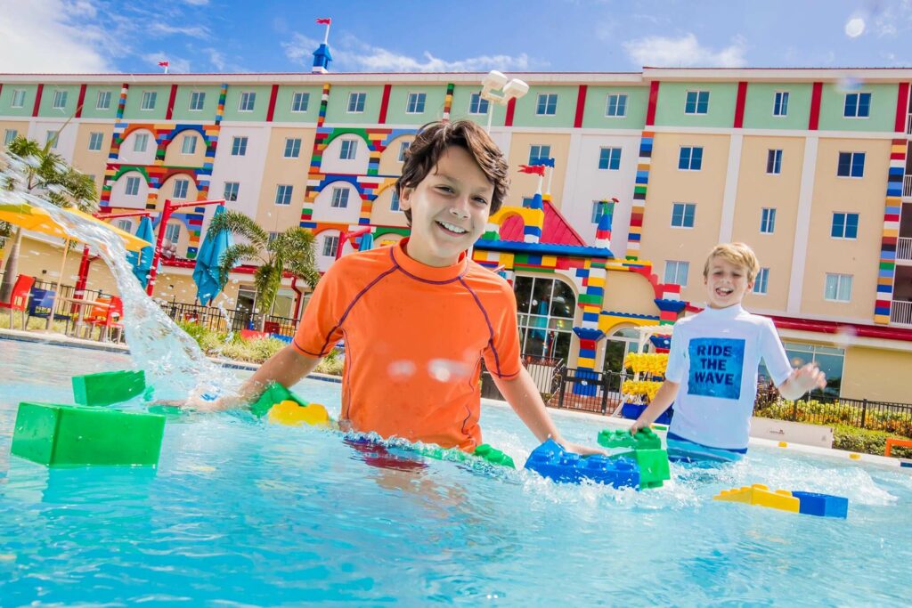 2 boys in pool at LEGOLAND Hotel in Winter Haven, FL