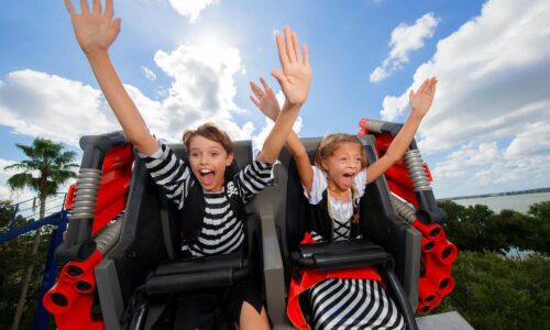2 kids on roller coaster during LEGOLAND Florida Piratefest Weekend
