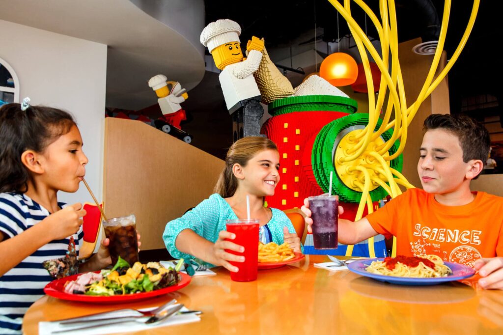 3 kids eating lunch at LEGOLAND's Bricks Family Restaurant